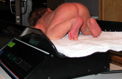malcolm_getting_weighed.jpg